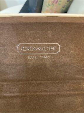 Coach white embossed clamshell sunglasses case